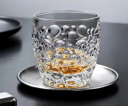 Dotted glass with saucer